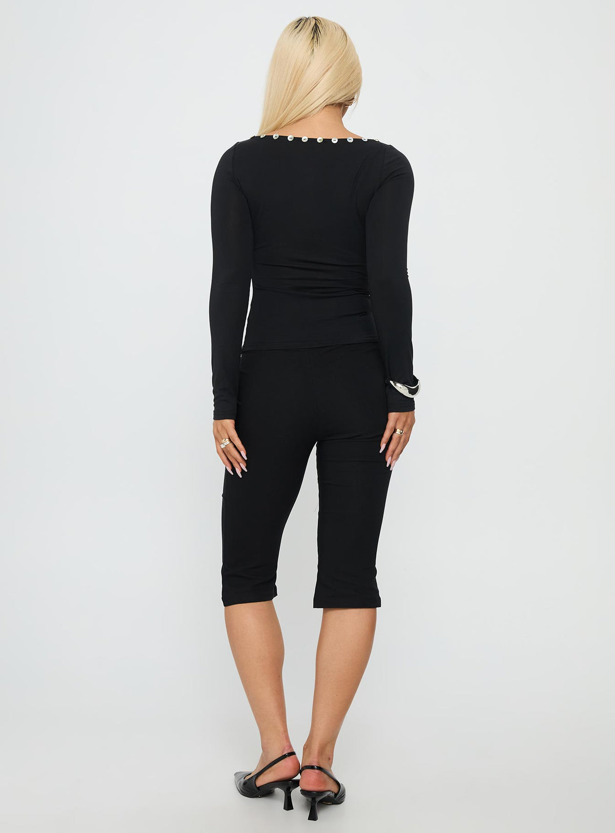 Introducing Samaira Capri Pant Black Petite womens-regular-pants with high-rise back view of model wearing
