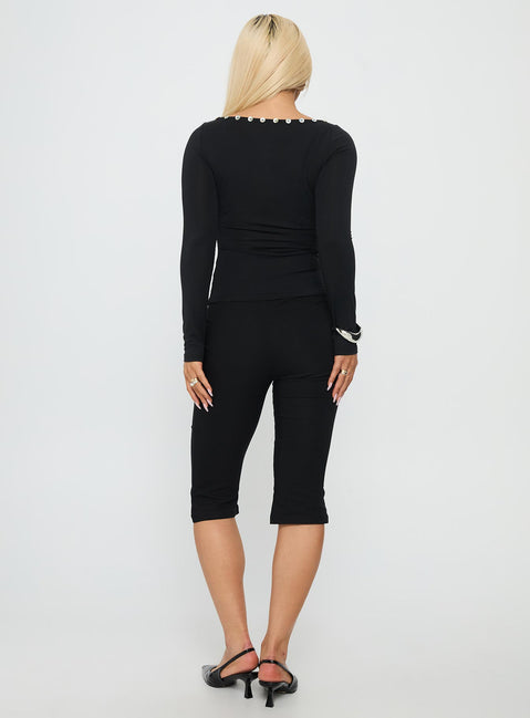 Introducing Samaira Capri Pant Black Petite womens-regular-pants with high-rise back view of model wearing