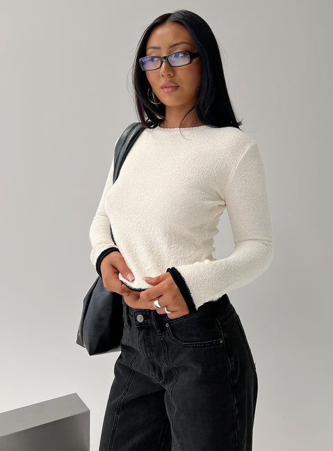 side view of model wearing Princess Polly Keree Lightweight Knit Sweater Cream cropped Jumpers 