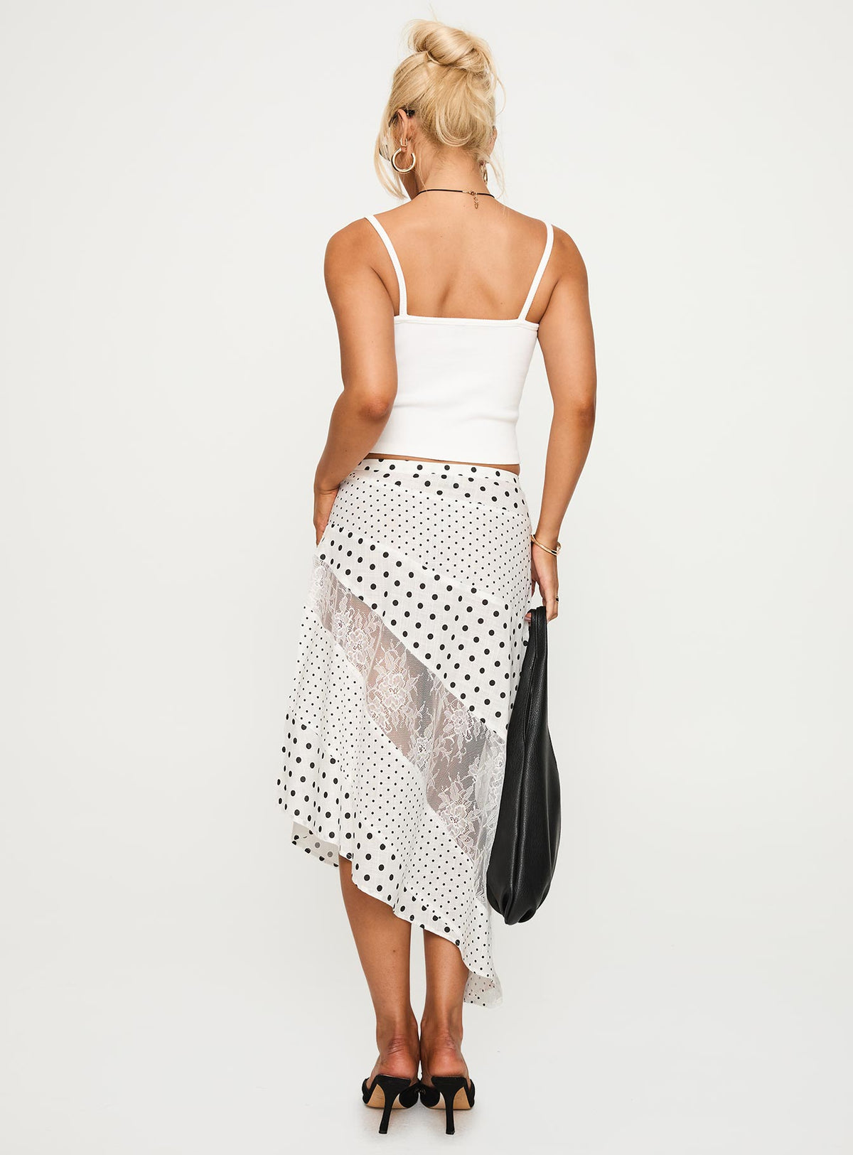 back view of model wearing Princess Polly Rennar Maxi Skirt White / Polka Dot Petite Midi Skirts Skirts 