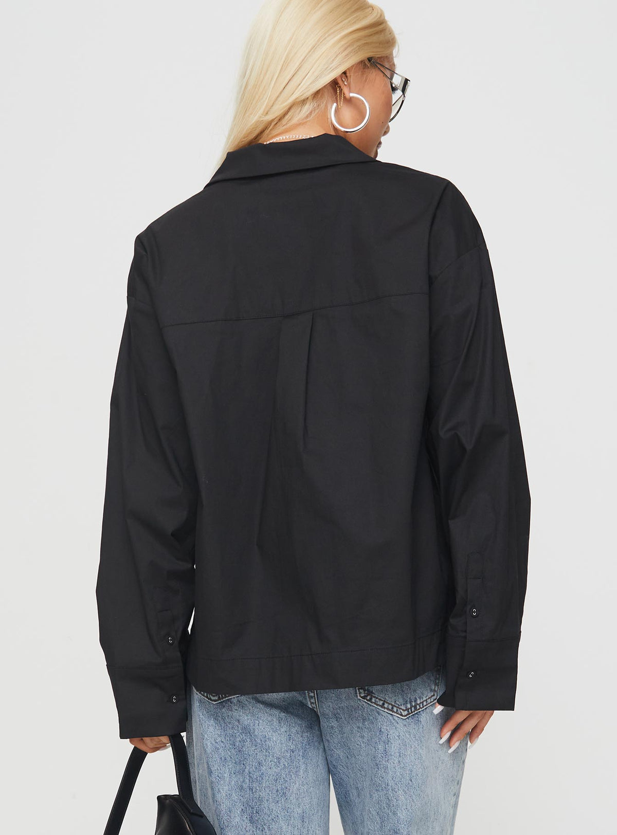 back view of model wearing Princess Polly Spiri Shirt Black Full Sleeves V-Neck 