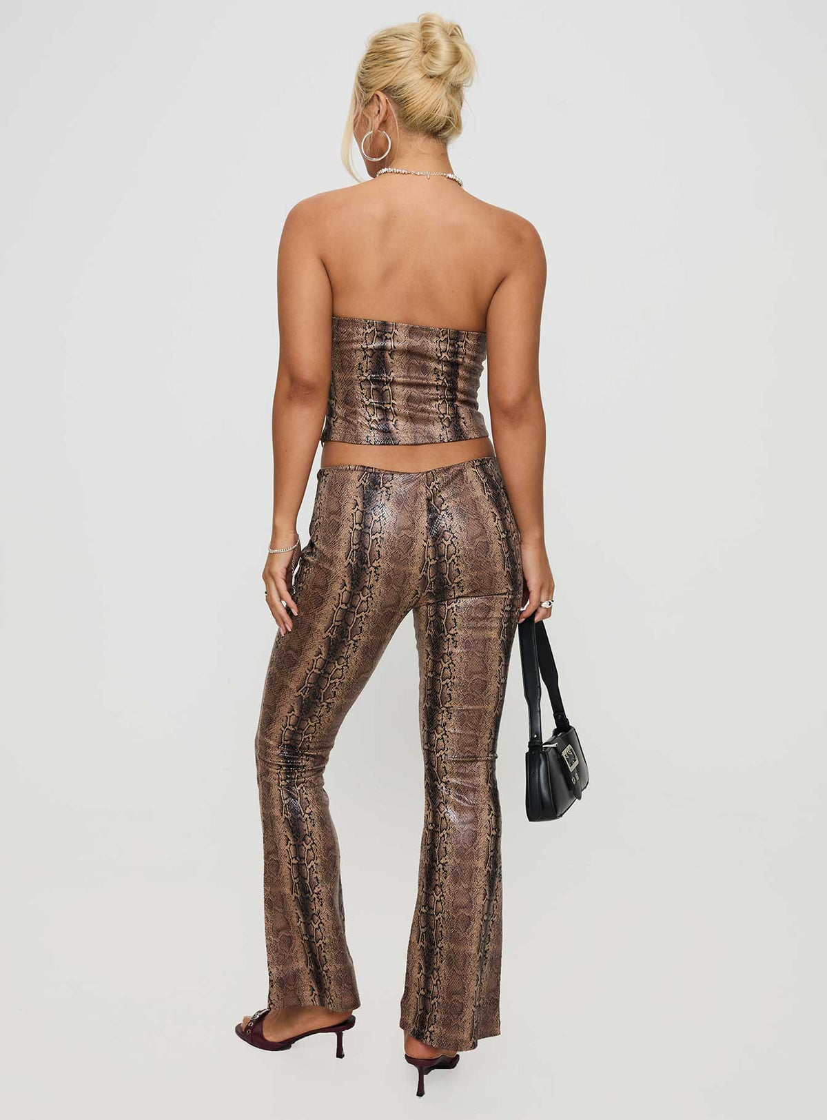 back view of model wearing Princess Polly Slither Pants Snake Print Low Rise Pants Pants 