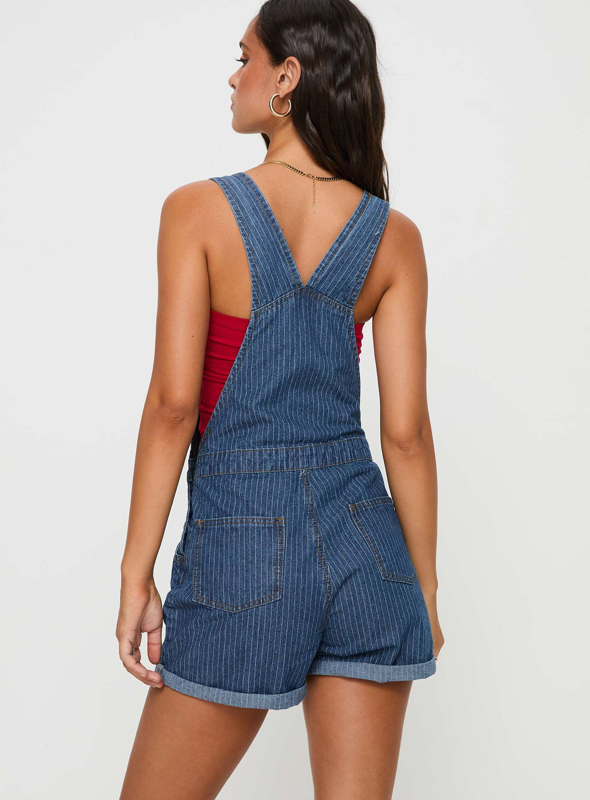 Blue Overalls Pinstripe print, gold-toned hardware, five pocket design, button fastening