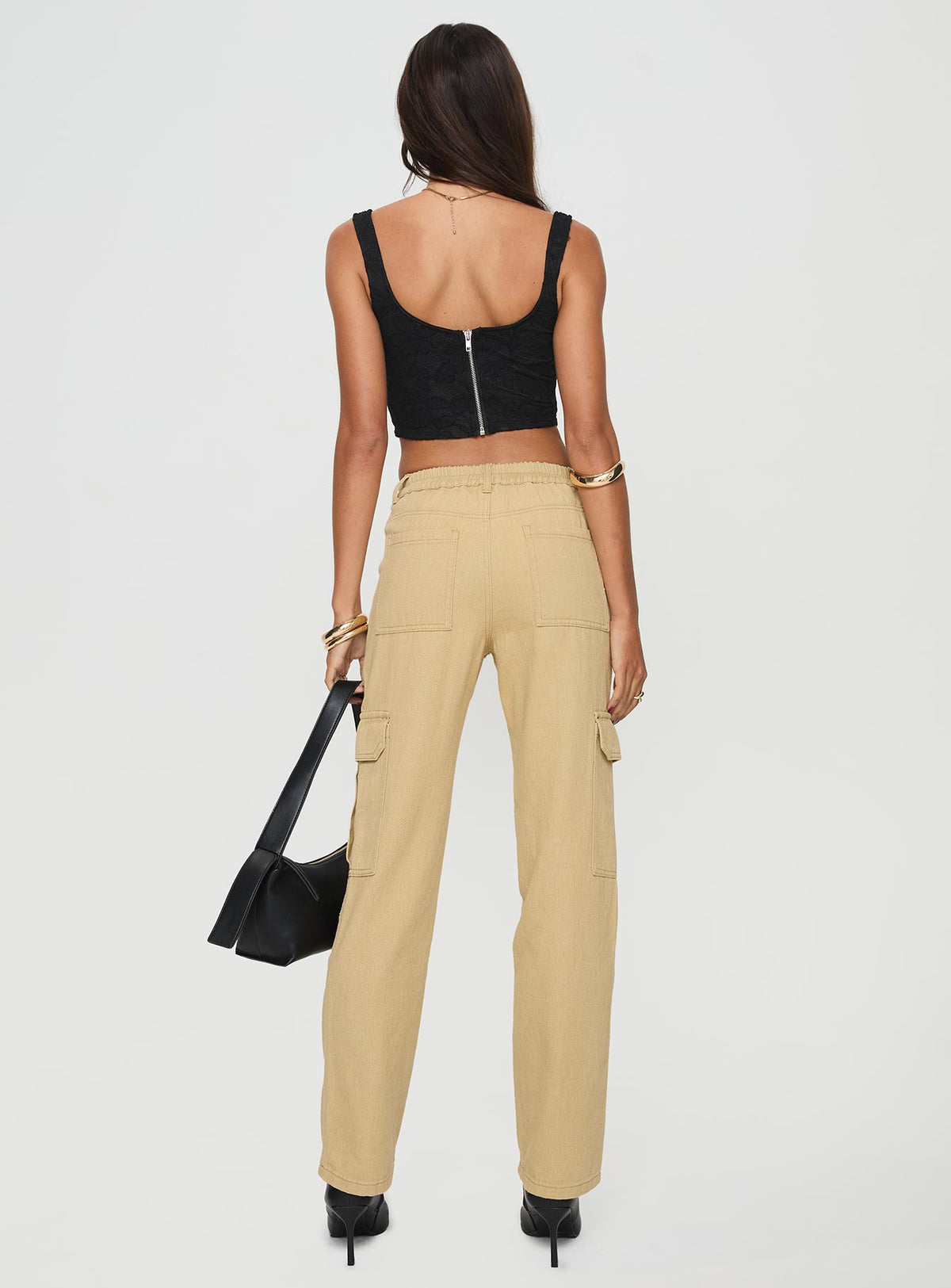 back view of model wearing Princess Polly Nickei Utility Cargo Pants Beige Mid Rise Pants Pants 