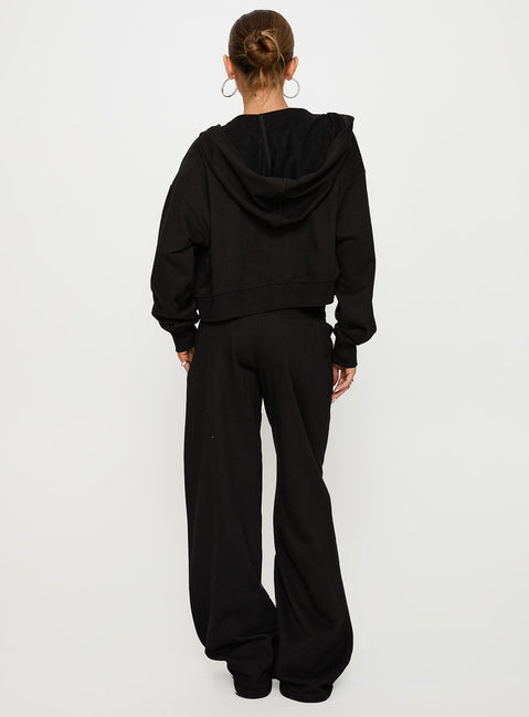 back view of model wearing Princess Polly Mindful Low Rise Pant Black Low Rise Pants Pants 