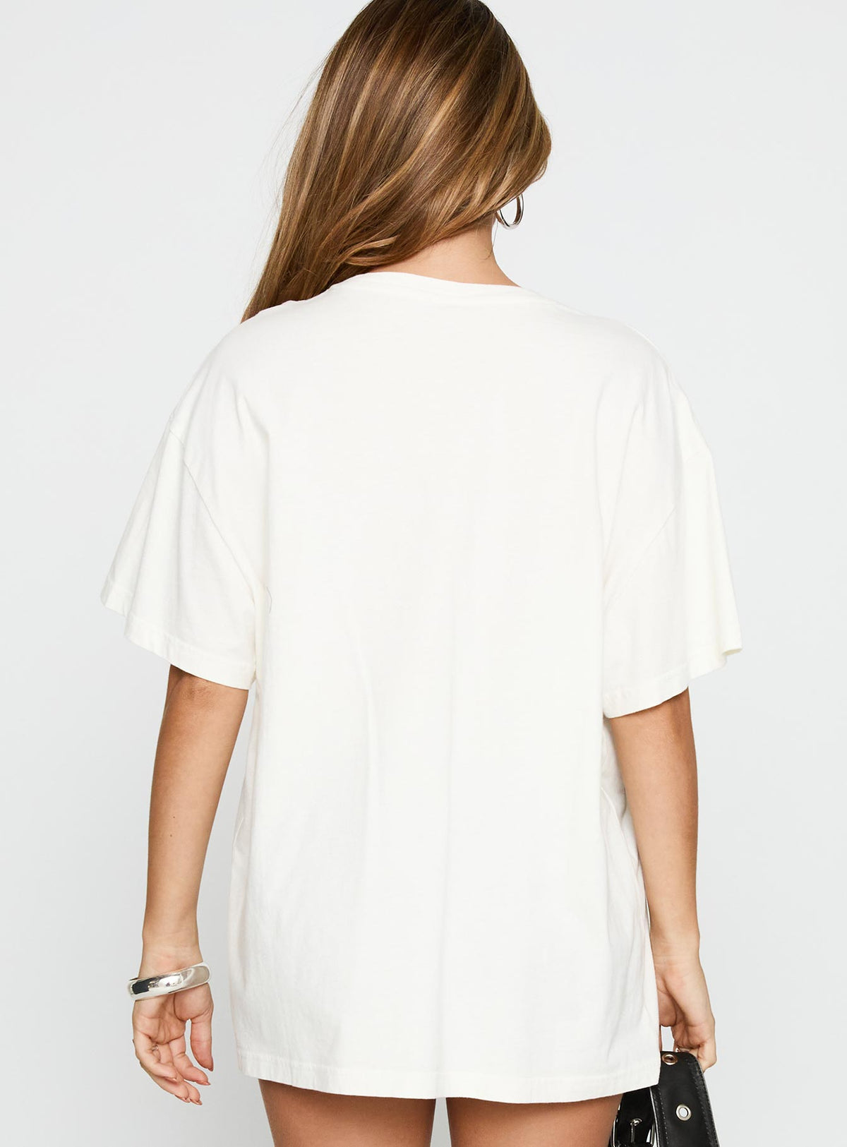 back view of model wearing Princess Polly Monaco Racing 99 Oversized Tee White Half Sleeves Crew Neck 