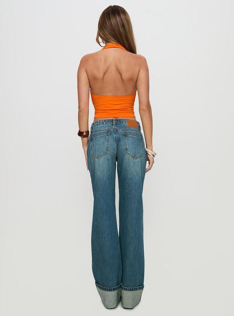 back view of model wearing Princess Polly Toros Mid Rise Wide Leg Foldover Denim Jeans Mid Blue Low Rise Jeans Jeans 