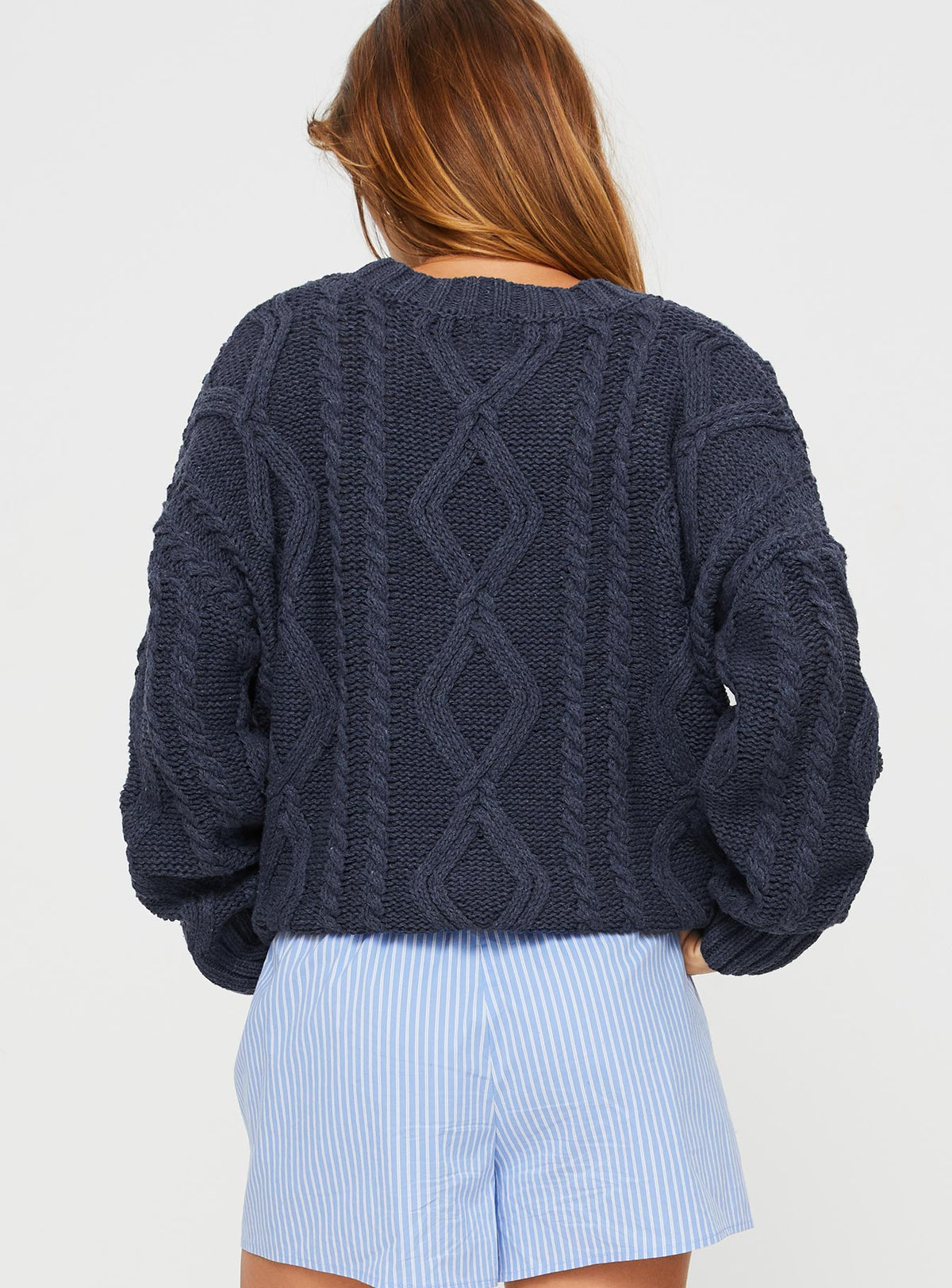 back view of model wearing Princess Polly Anaya Oversized Sweater Navy Cropped Jumpers Jumpers 