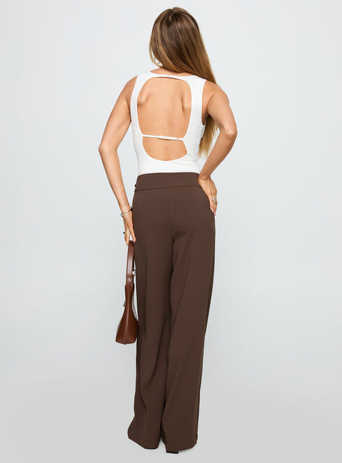 back view of model wearing Princess Polly Rush Hours Pants Chocolate High Rise Pants Pants 