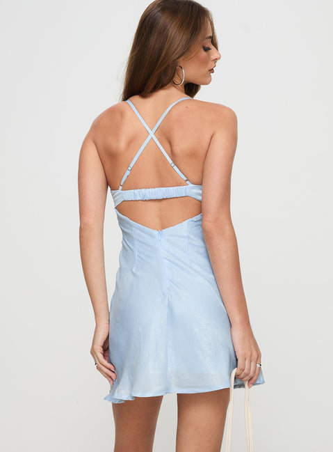 back view of model wearing Princess Polly Glendon Mini Dress Blue Petite Sweetheart Neckline 