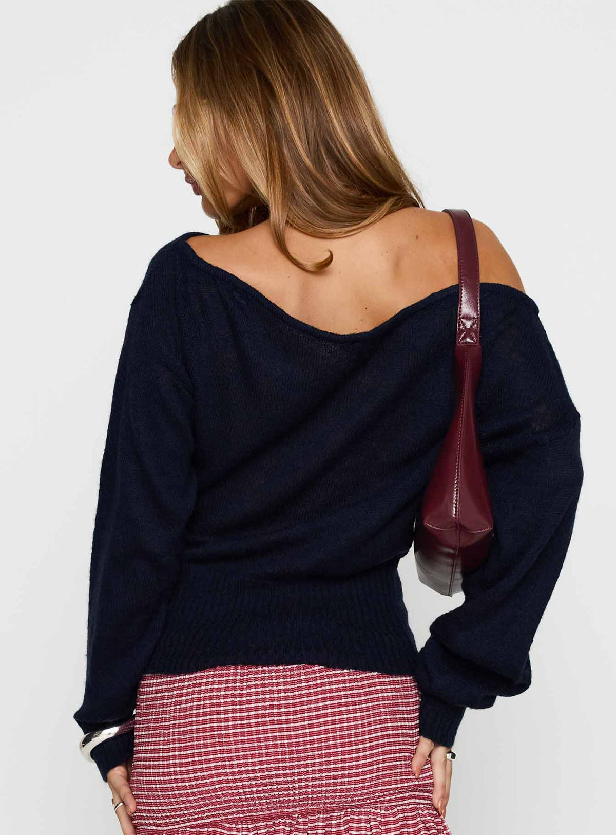 back view of model wearing Princess Polly Suena Jumper Navy Long 
