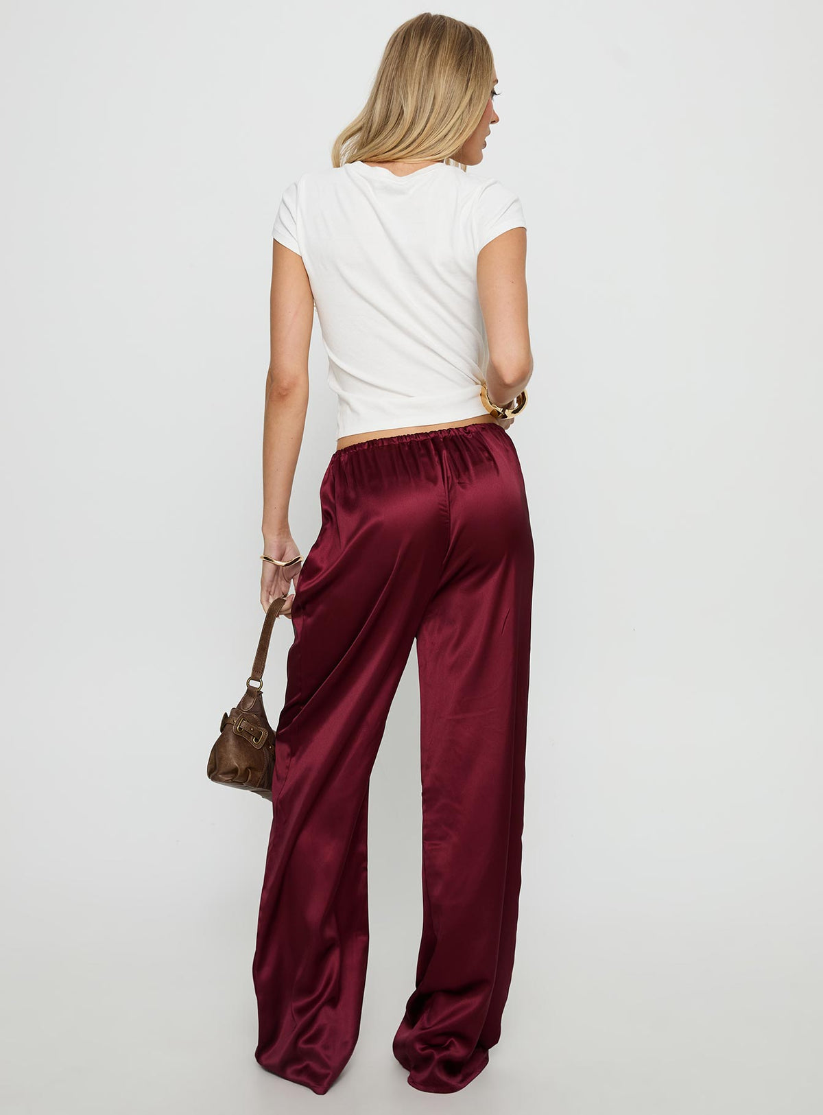 back view of model wearing Princess Polly Soulstar Satin Pants Wine Mid Rise Pants Pants 