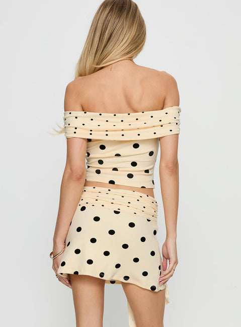 back view of model wearing Princess Polly Porzia Wrap Detail Mini Skirt Cream / Polka Dot Mini Skirts Skirts 
