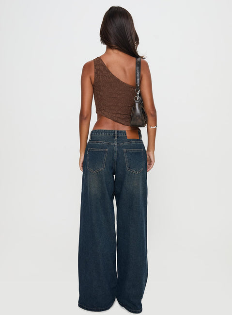back view of model wearing Princess Polly Low Rise Wide Leg Jean Hocus Pocus Wash Low Rise Jeans 