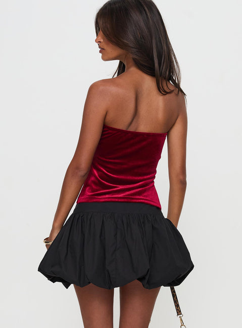 back view of model wearing Princess Polly Marentino Bubble Hem Mini Skirt Black Mini Skirts Skirts 