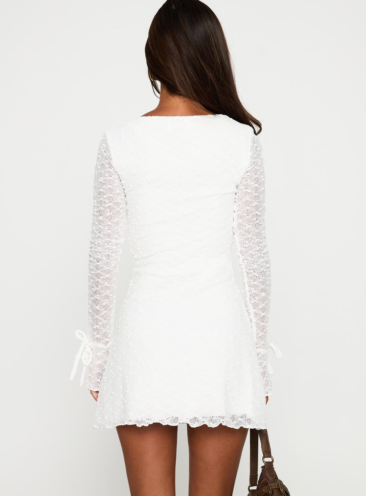 back view of model wearing Princess Polly Dalzine Long Sleeve Mini Dress White Sweetheart Neckline 