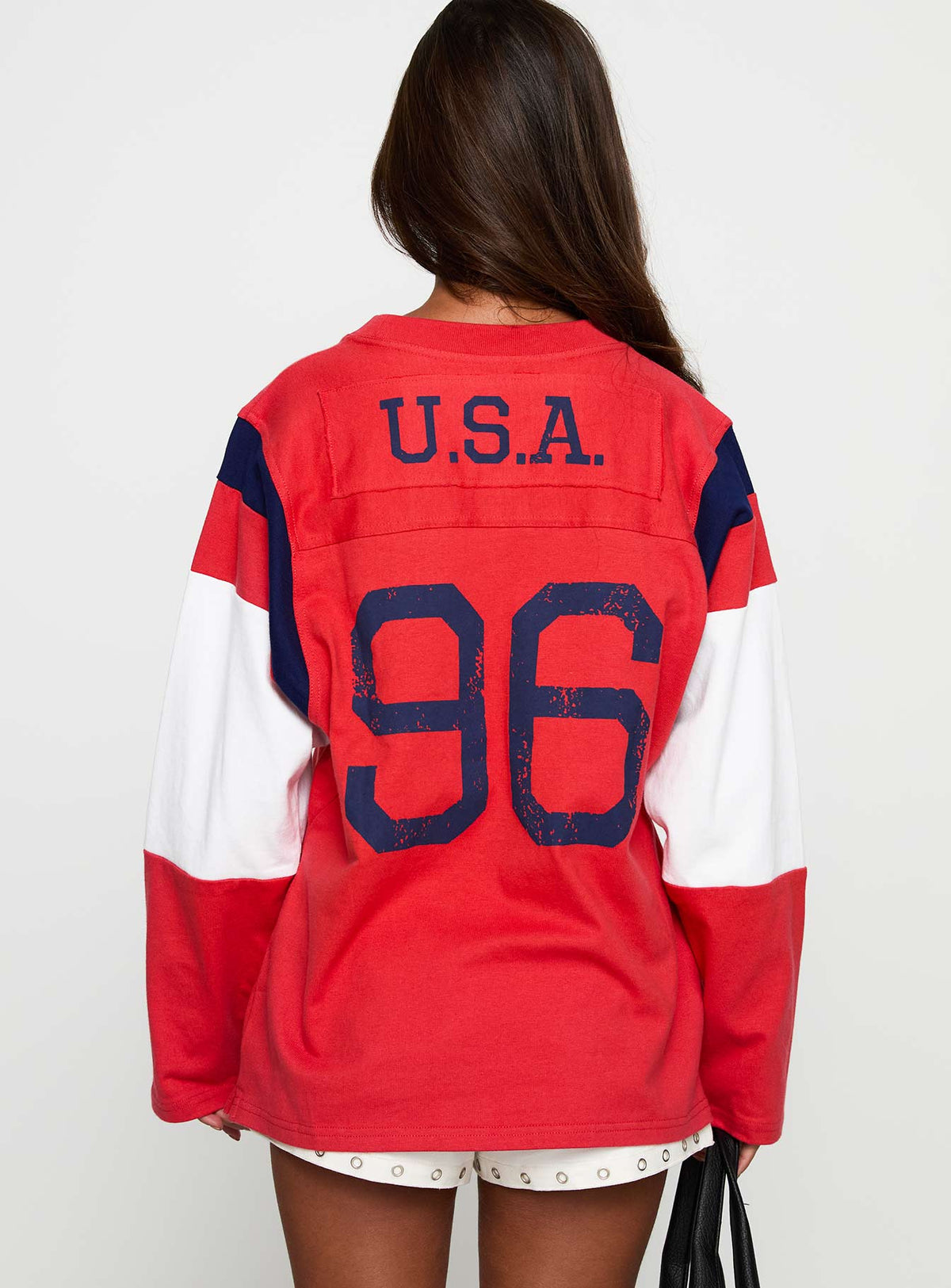 back view of model wearing Princess Polly MLS 96 Retro Long Sleeve Top Red Full Sleeves Crew Neck 