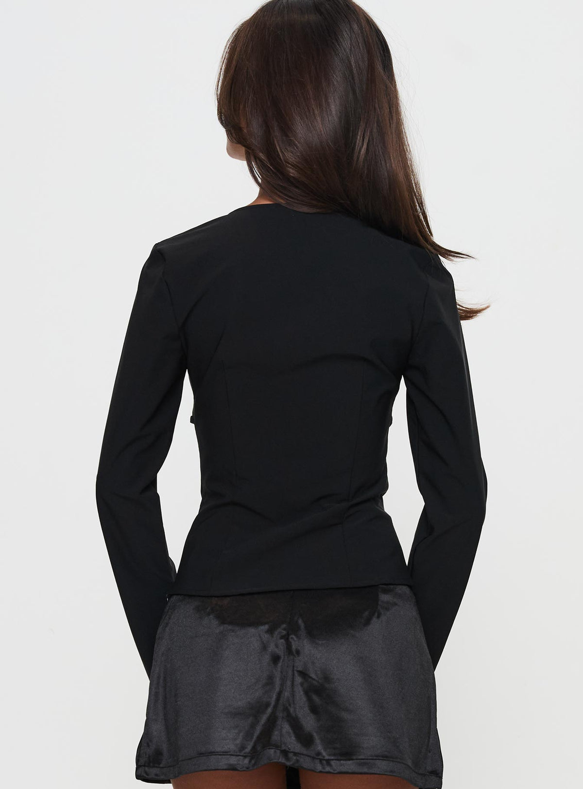 back view of model wearing Princess Polly Flounce Long Sleeve Top Black Full Sleeves Square Neck 