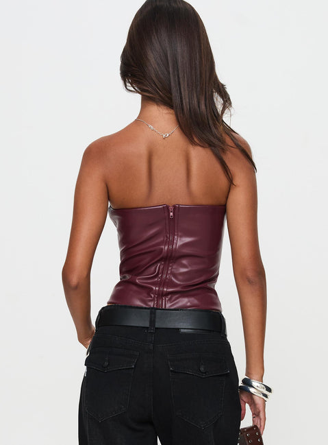 back view of model wearing Princess Polly Oaklee Strapless Faux Leather Top Burgundy Sleeveless straight 