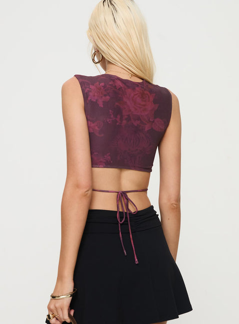 back view of model wearing Princess Polly Uzo Top Red Floral Sleeveless Crew Neck 