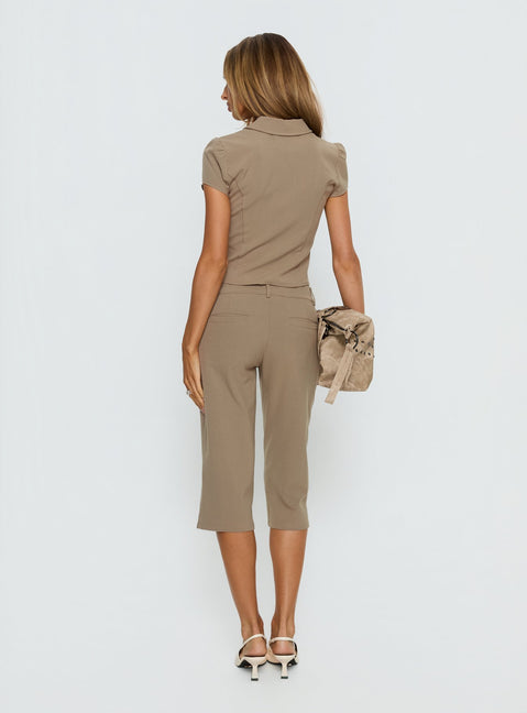 back view of model wearing Princess Polly Tunian Capri Tailored Pants Taupe Mid Rise Pants Pants 