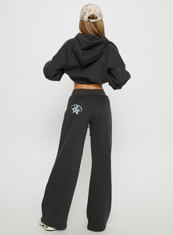 back view of model wearing Princess Polly Princess Polly Stargirl Wide Leg Sweat Pants Charcoal High Rise Pants Pants 
