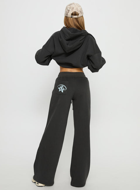 back view of model wearing Princess Polly Princess Polly Stargirl Wide Leg Sweat Pants Charcoal High Rise Pants Pants 