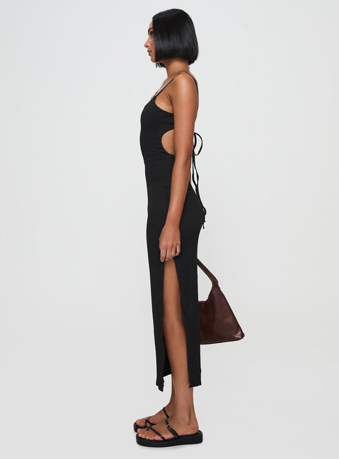 side view of model wearing Princess Polly Elestria Maxi Dress Black Scoop Neck 