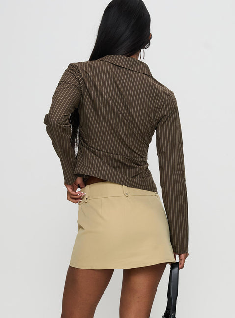 back view of model wearing Princess Polly Caitlan Mini Skirt Beige Mini Skirts Skirts 
