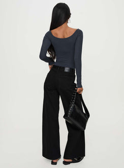 back view of model wearing Princess Polly Colemane Mid Rise Wide Leg Jeans Black High Rise Jeans Jeans 
