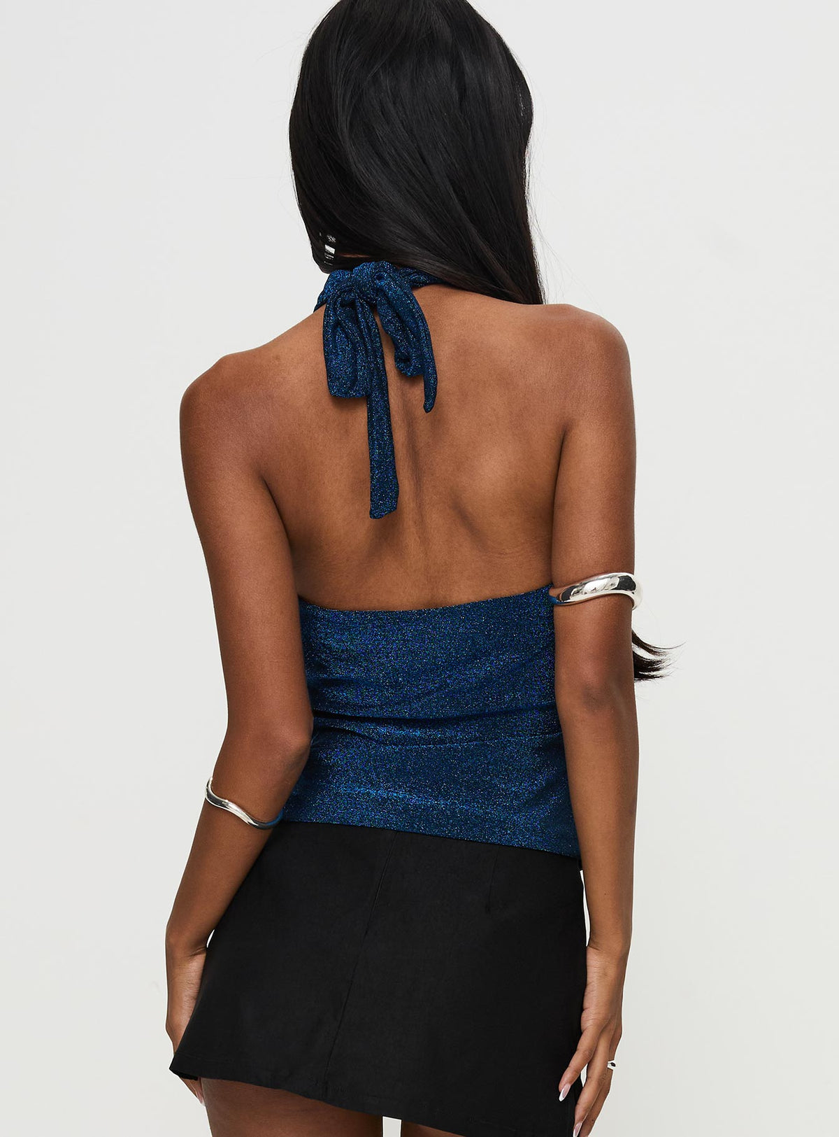 back view of model wearing Princess Polly Treat Me Nice Cross Neck Top Blue Glitter Sleeveless High Neck 