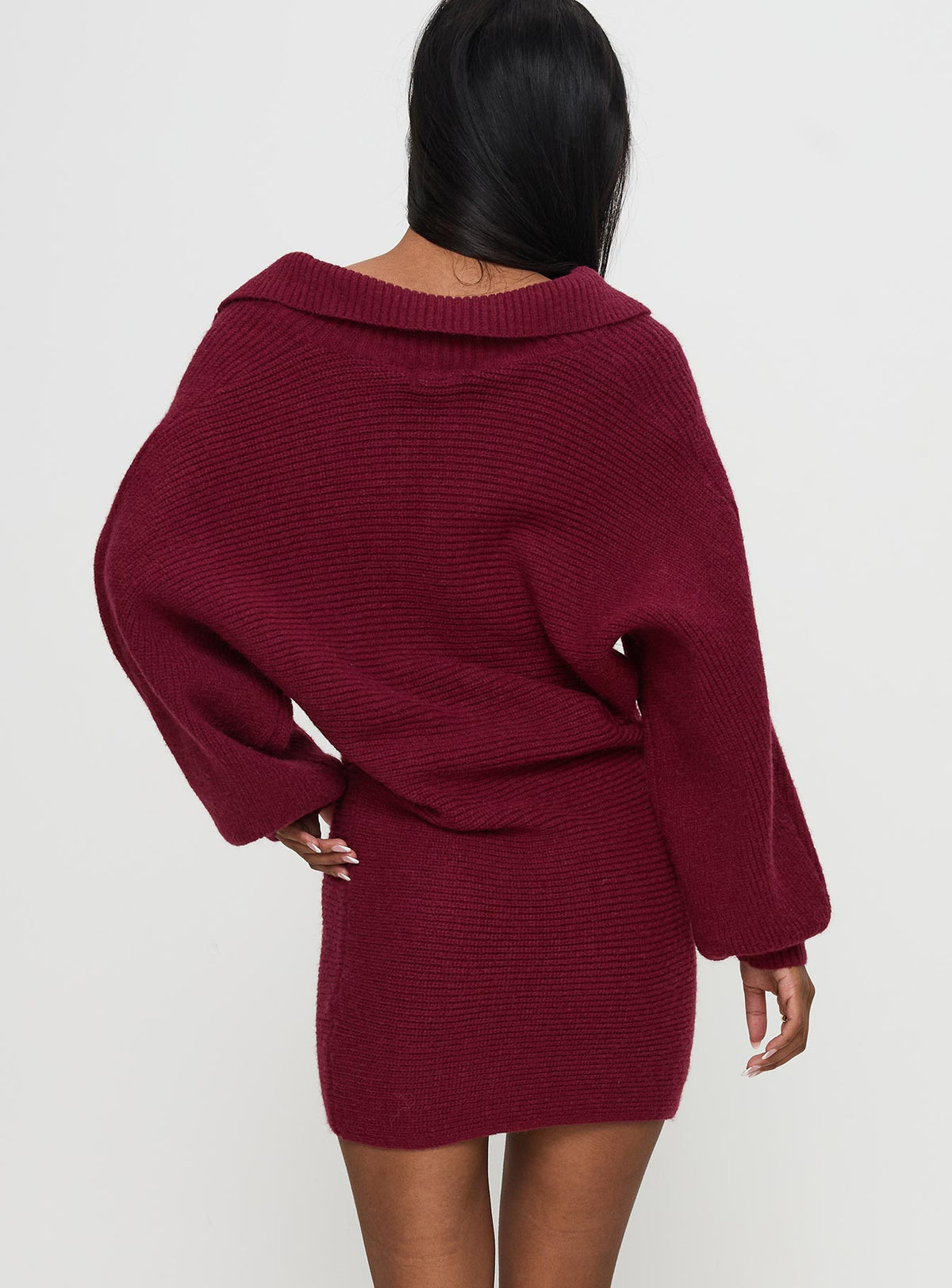 back view of model wearing Princess Polly Thorelle Sweater Mini Dress Burgundy V-Neck 