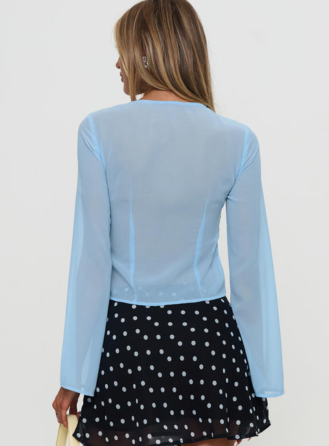 back view of model wearing Princess Polly Coates Long Sleeve Top Blue Full Sleeves Crew Neck 