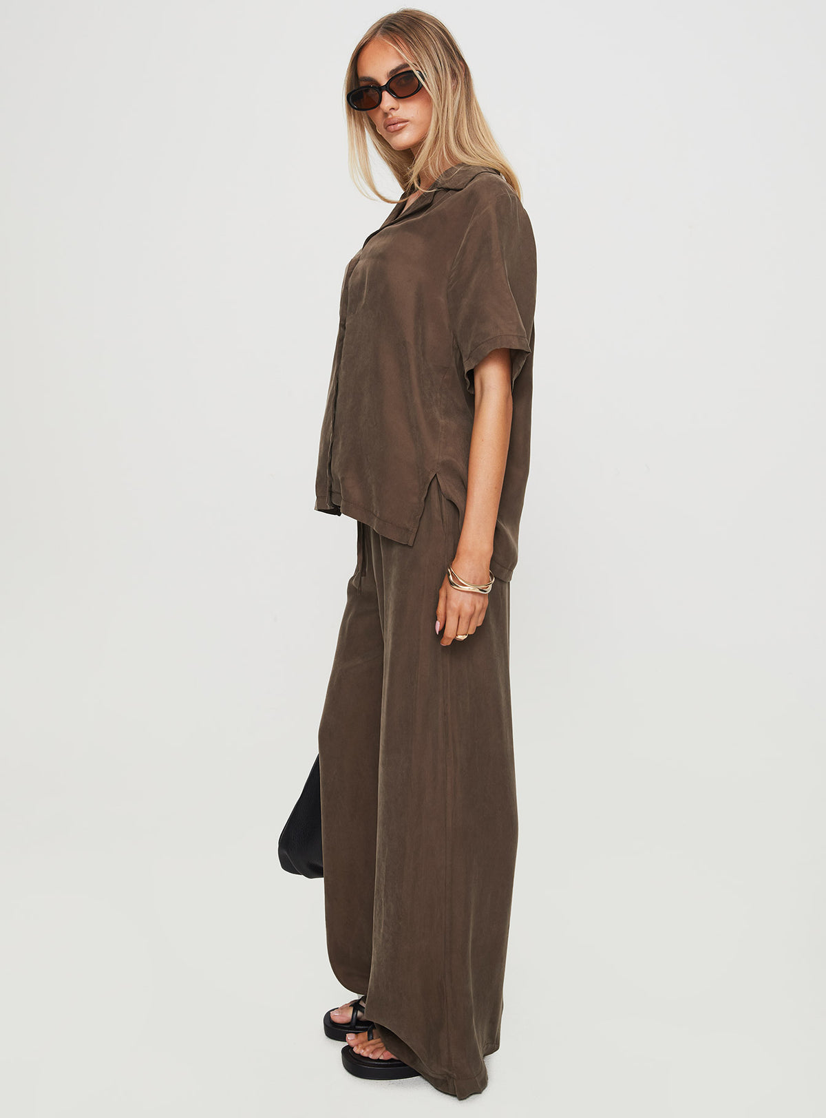side view of model wearing Princess Polly Mahlab Pants Chocoloate High Rise Pants Pants 