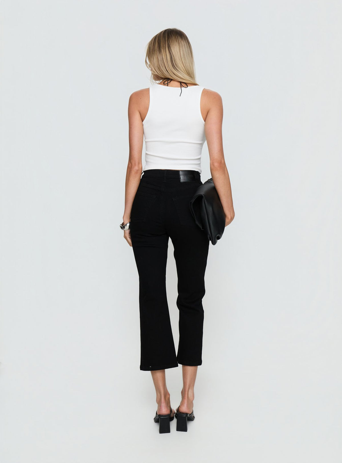 back view of model wearing Princess Polly Cindee High Rise Cropped Jeans Jet Black High Rise Jeans Jeans 