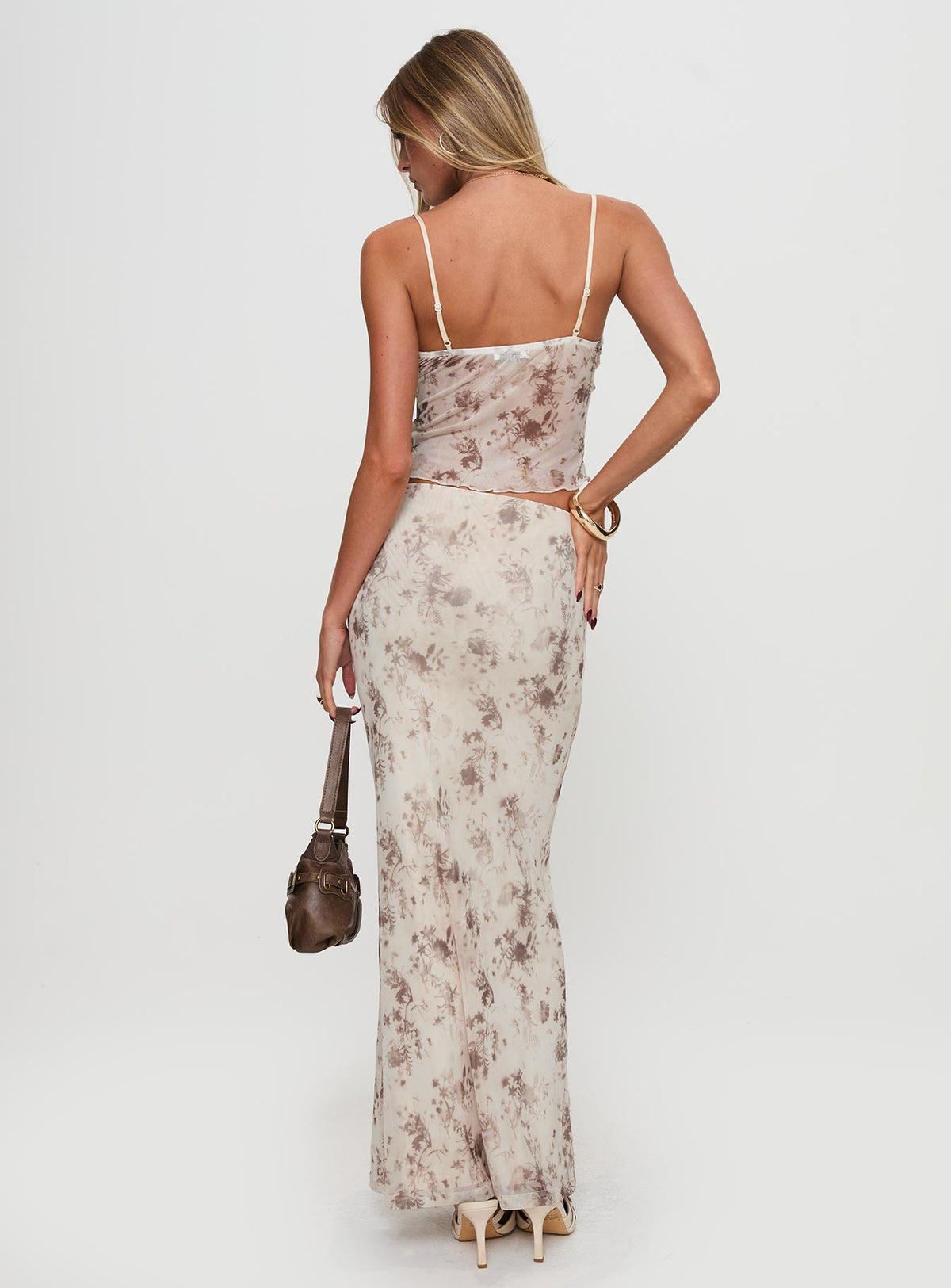 back view of model wearing Princess Polly Shepherd Top Floral Multi Sleeveless Plunger 