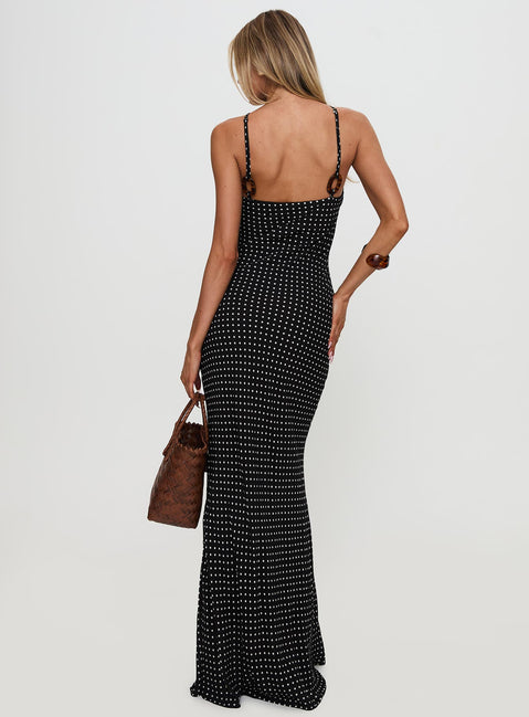 back view of model wearing Princess Polly Evyn Halter Maxi Dress Polka Dot Asymmetric Neckline 