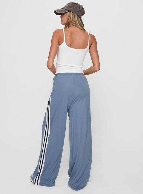 back view of model wearing Princess Polly Dime Track Pants Blue High Rise Pants Pants 