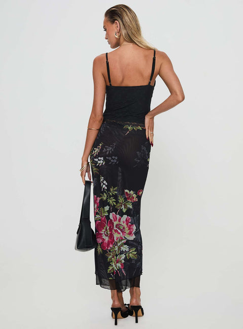 back view of model wearing Princess Polly Paganio Maxi Skirt Black Floral Maxi Skirts Skirts 