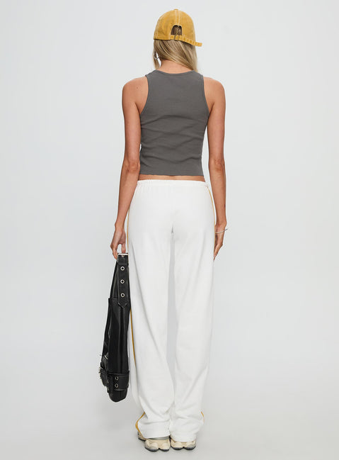 back view of model wearing Princess Polly Elation Low Rise Straight Leg Track Pant White Low Rise Pants Pants 