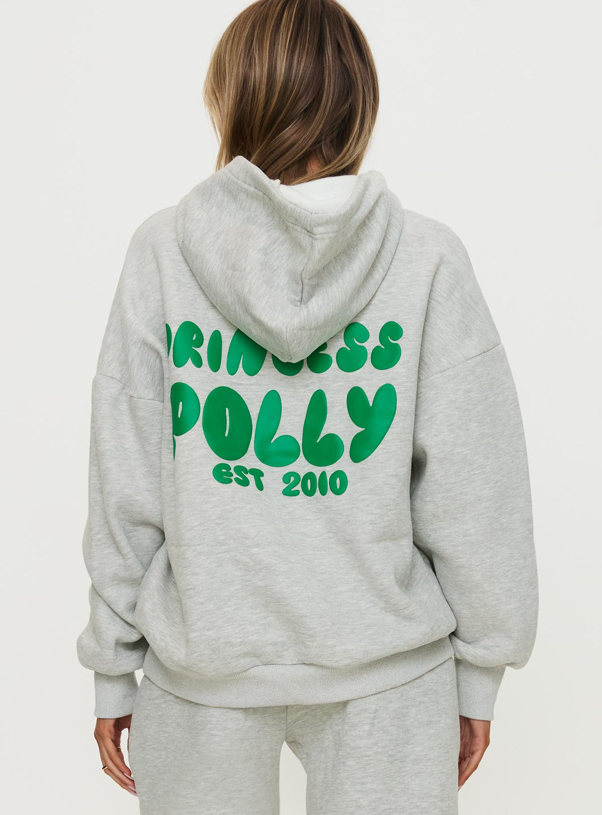 back view of model wearing Princess Polly Princess Polly Hooded Sweatshirt Bubble Text Grey Marle / Green Jumpers 