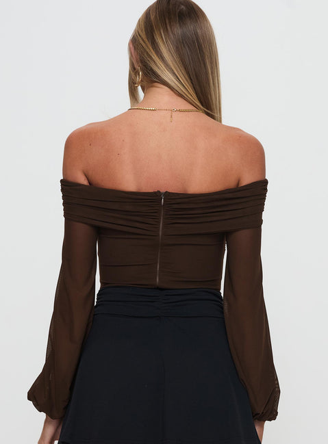 Designed with full sleeves and ruched features, the Babette Off The Shoulder Bodysuit in Brown womens-bodysuit back view of model wearing