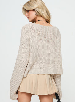 Displaying the Artha Cardigan Beige womens-jumpers with short length back view of model wearing Princess Polly