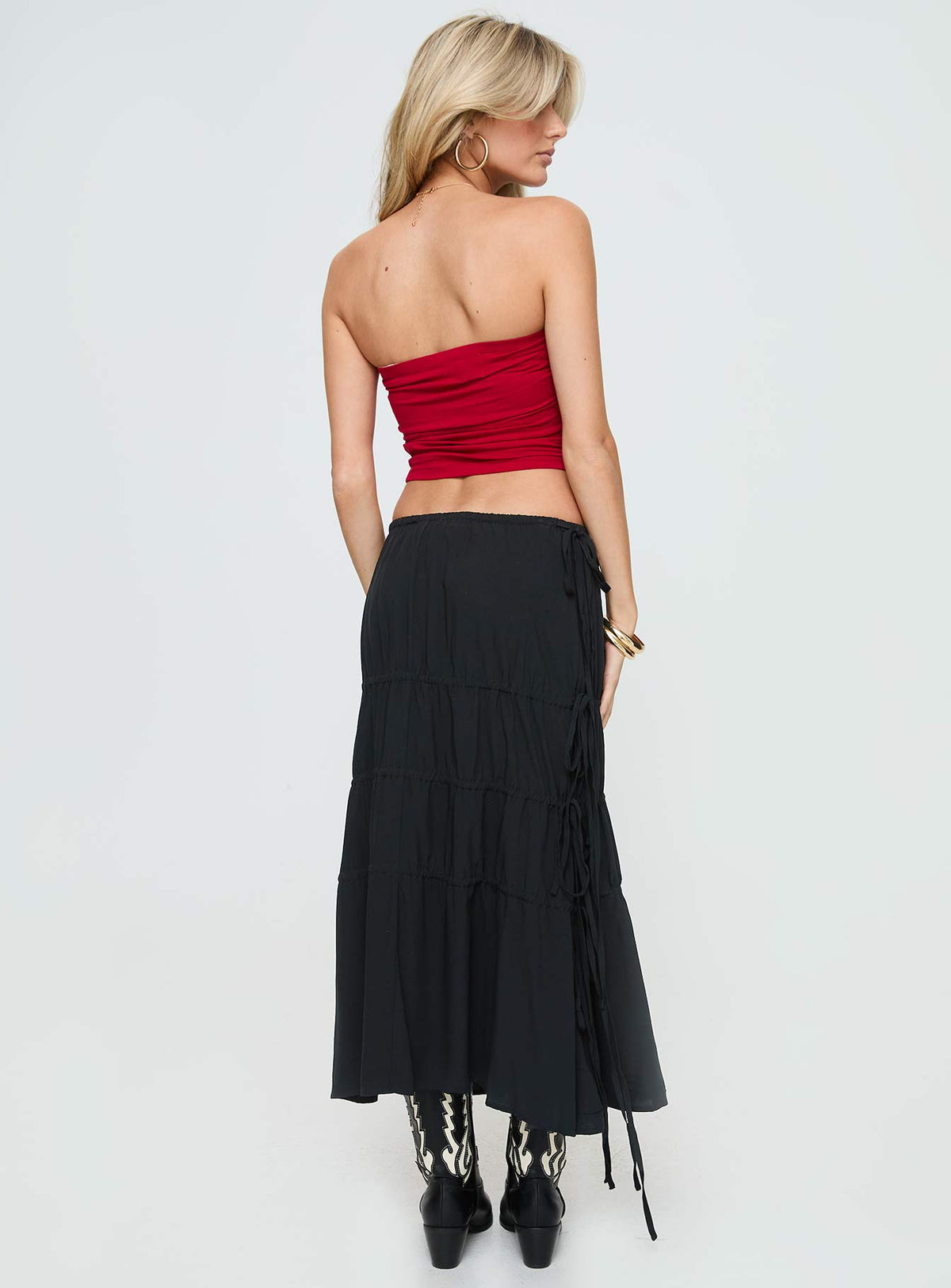 back view of model wearing Princess Polly Perky Maxi Skirt Black Maxi Skirts Skirts 