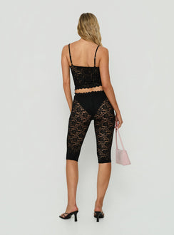 Presenting the Torrin Lace Capri Pants Black womens-regular-pants featuring high-rise back view of model wearing Princess Polly