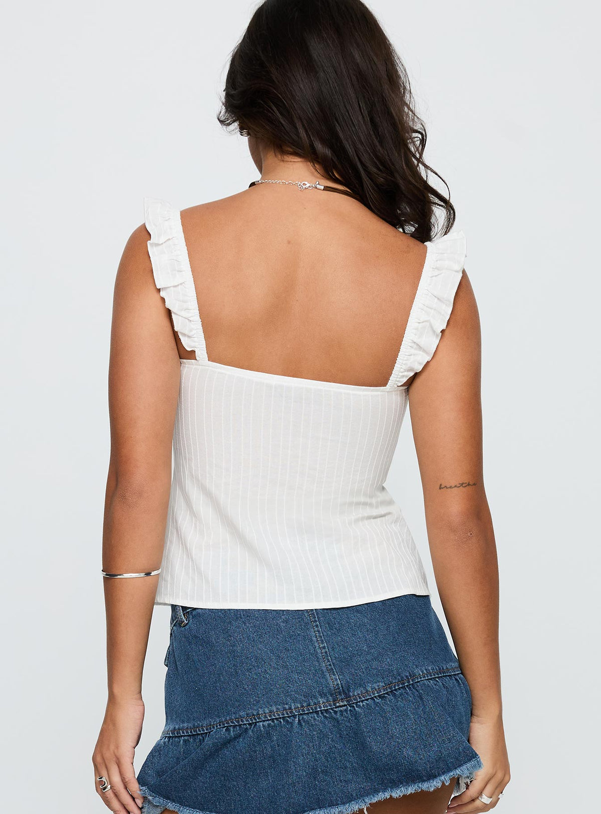 back view of model wearing Princess Polly Madaleine Top White Sleeveless Scoop Neck 