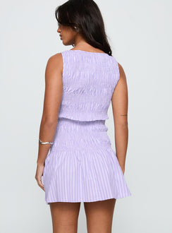 back view of model wearing Princess Polly Home Grown Shirred Mini Dress Lilac Stripe Boat Neck 
