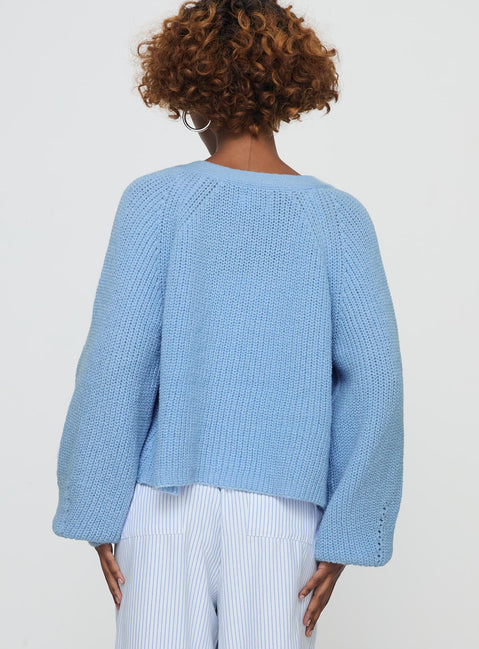back view of model wearing Princess Polly Leskie Cardigan Pale Blue Cropped Jumpers Jumpers 
