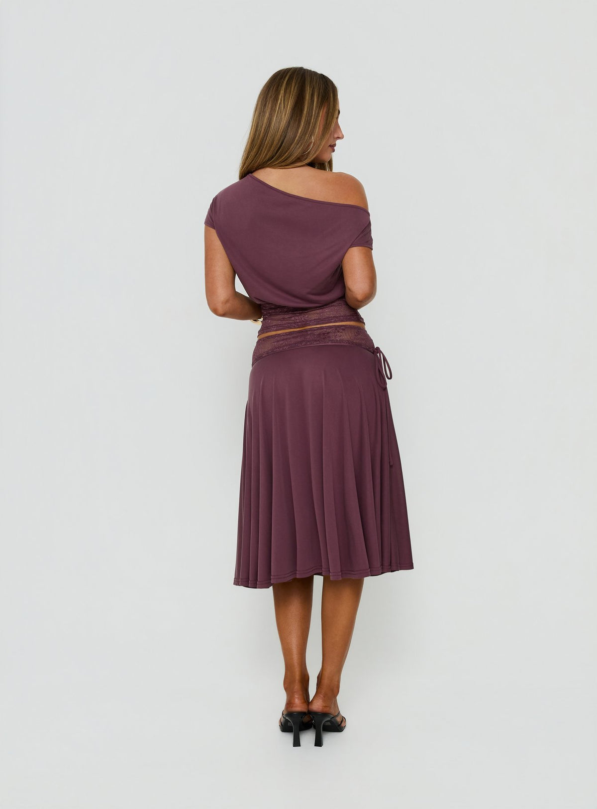 Displaying the Marienna Lace Midi Skirt Plum in womens-skirts back view of model wearing Princess Polly