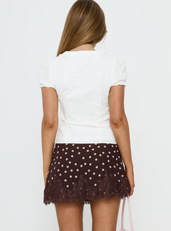 back view of model wearing Princess Polly Your Dreams Lace Mini Skirt Brown Polka Dot Mini Skirts Skirts 